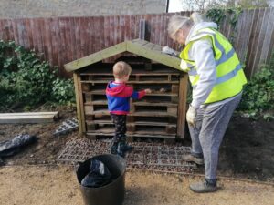 Gandy Field furnishing the bug hotel